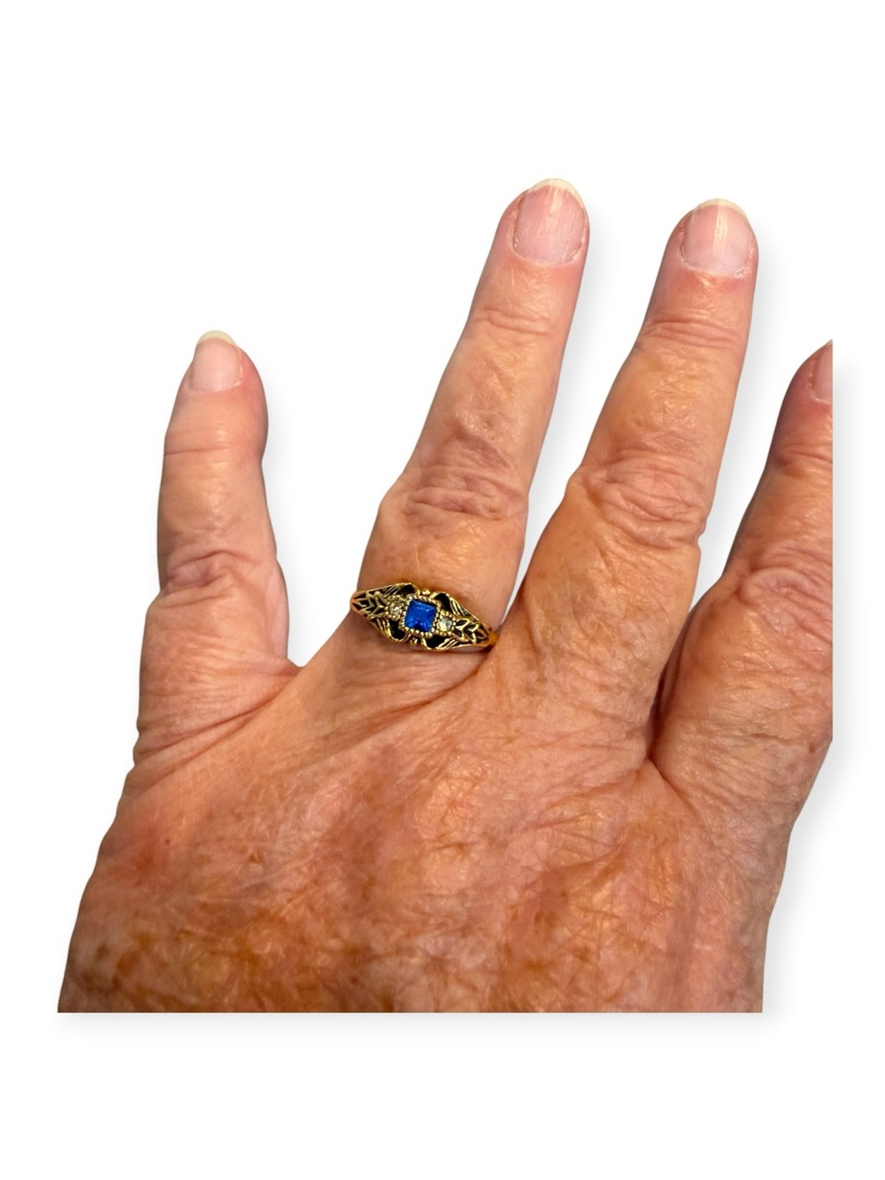 Vintage-Inspired Gold Filigree Ring with Blue Stone and Gold tone Hoop Earrings